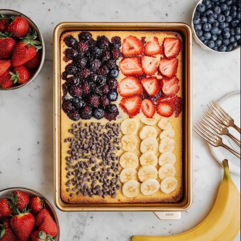 Sheet Pan Pancakes with Fresh Berries, Bananas, and Chocolate Chips Recipe